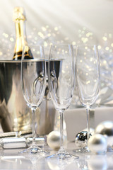 Three empty champagne glasses ready to be filled