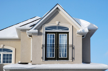 House with a balcony in winter