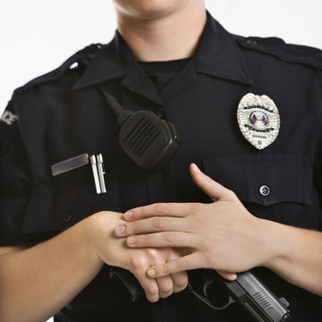 Policewoman with gun.