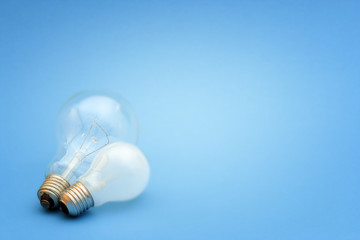 Background with lit lightbulb