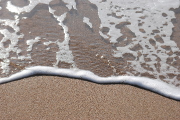 Fototapeta na wymiar sable et mer