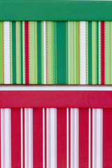 Green and red striped Christmas gift boxes
