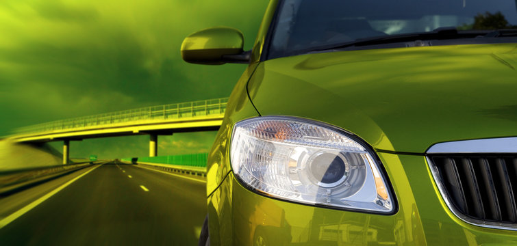 Green Car On The Road