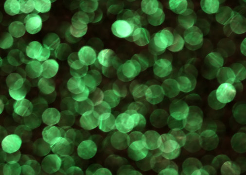 Abstract defocused green light battern background