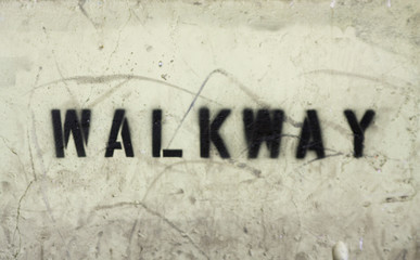walkway stencilled on new york wall