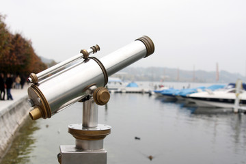a viewing telescope at lake luzern
