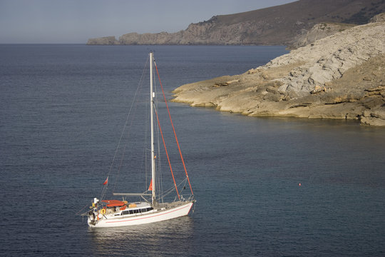 A sailboat in a calm bay