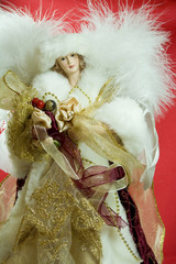 Beautiful Christmas angel on red