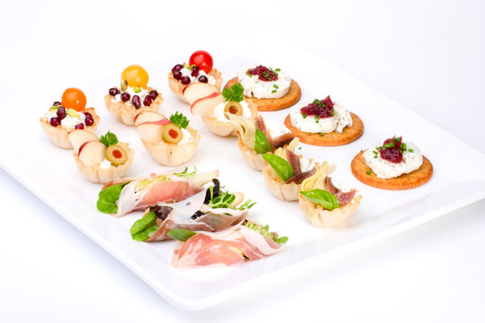 Tray with ready-to-eat fresh sandwiches on holiday table
