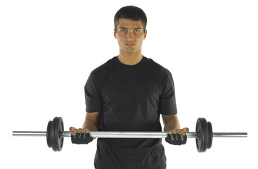 Young man exercising arms muscles with barbell