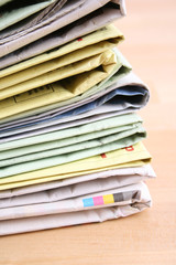 stack of newspapers on the table - close-ups