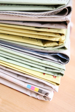 stack of newspapers on the table - close-ups