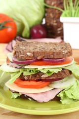 big sandwich and everything you need to have delicious breakfast