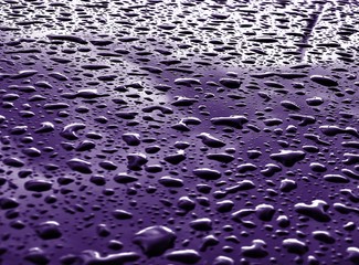 rain drops on metallic surface