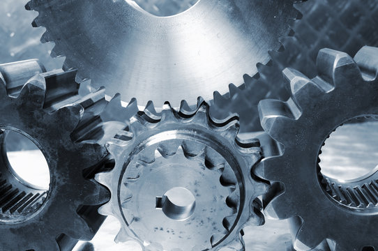 large industrial gears in conceptual toning