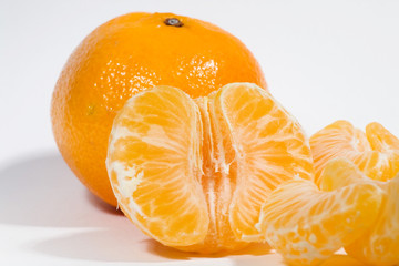 orange ripe mandarin on white background