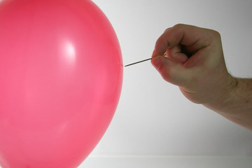 Luftballon und Nadel