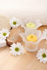 Fototapeta na wymiar beauty treatment - towel candles and flower 