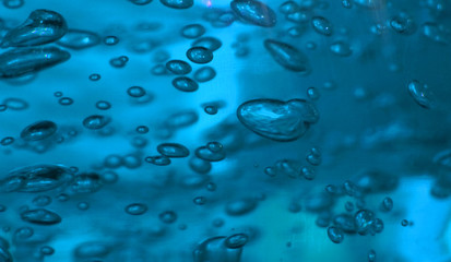 real water texture in the blue color with bubbles
