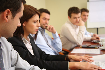 five businesspeople conceptual work