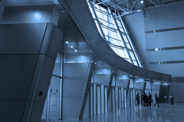 People silhouettes at airport building