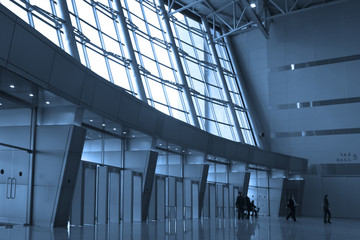 People silhouettes at airport building