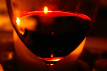 Candlelight and a glass of wine
