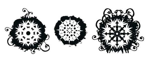 Grunge snowflakes brush designs with floral swirls and scrolls
