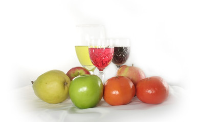 Different fruits and colorful drinks on white background