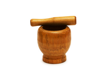 Old wooden mortar and pestle isolated on white..