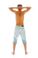 Fototapeta premium tanned man in jeans isolated on white background