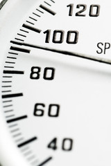 a speedometer gauger - shallow depth of field, focus on 100