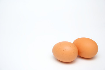 Isolated brown eggs