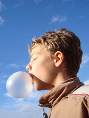Boy with chewing gum bubble 3