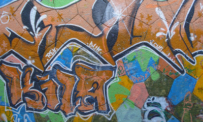 Graffiti on wall, multi colored spray