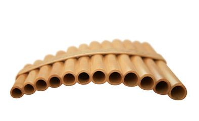 Wooden pan flute on a white background. It is isolated