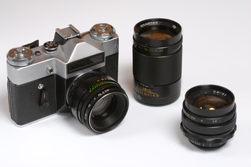 Old soviet 35mm film camera with normal, wide and tele lenses