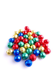 Pralines in the colored paper