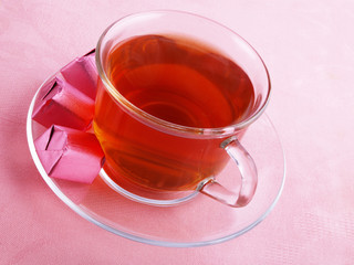 hot tea with chocolate on the pink serviette