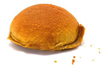 Coffee bun and crumbs isolated on white background