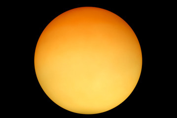Moody glowing orange planet at black skies