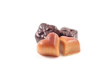 four delicious pralines - heart and gift shape 