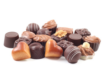 various delicious pralines isolated on white