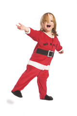 Child in santa pyjamas