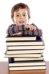 Adorable child studying a over white background