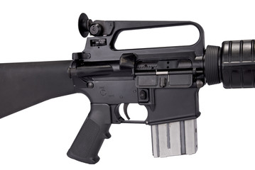 Machine gun detail of trigger and clip isolated over white