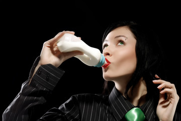 business woman is drinking milk from baby bottle 2
