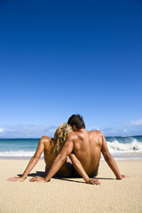 Couple on beach. - 5439671