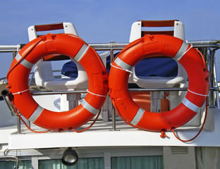 A couple of life rings aboard on a yacht bridge