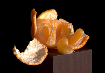Cleared mandarine on a black background.